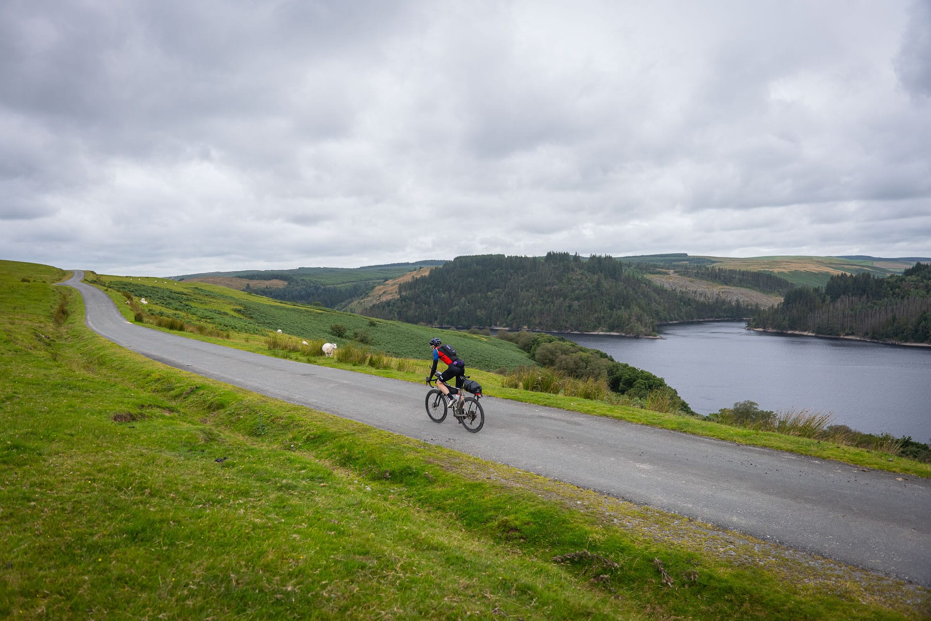 A rider on the road above Llyn Brianne reservoir