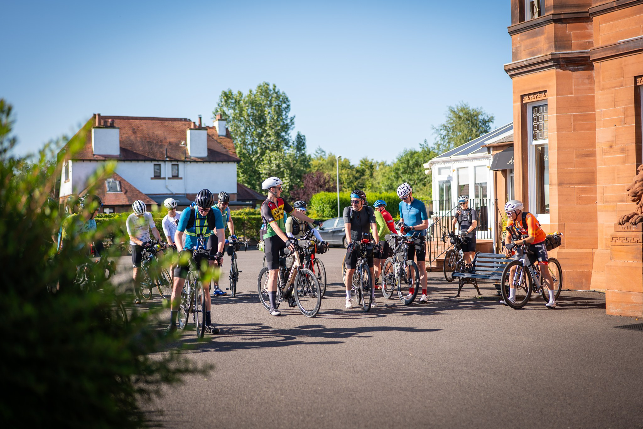 Riders lined up at the start outside the hotel